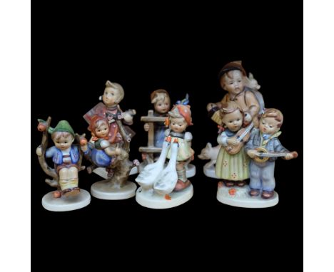 A group of 7 Goebels Hummel figures, tallest 14cm 
