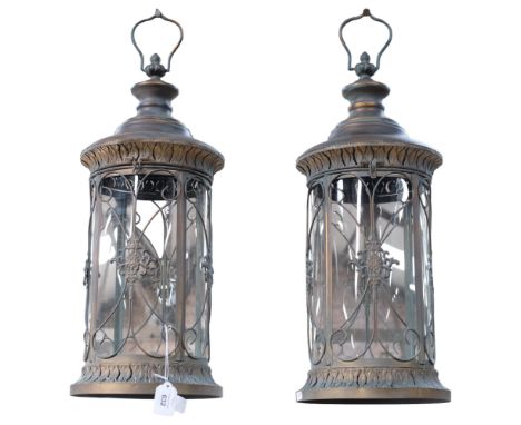 A pair of large bronze-effect oval hanging lanterns, with 4 glass panels, drop approx 62cm 