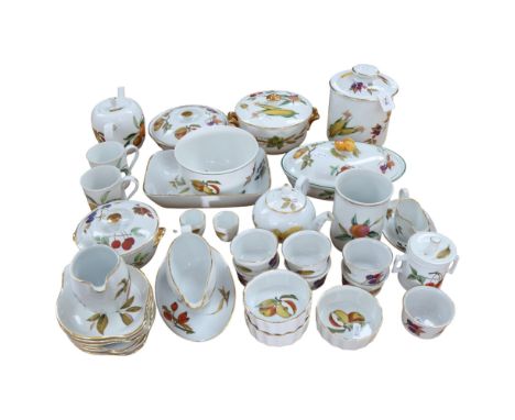 A large quantity of Royal Worcester Evesham pattern table and dinnerware, comprising lidded tureens, sauce boats, teapot, ram