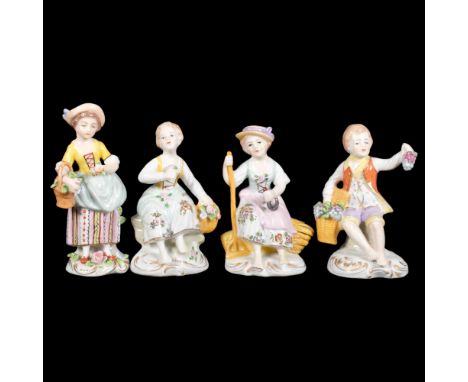 A group of Sitzendorf porcelain figures, including a girl on a tree stump, tallest 12cm (6) 