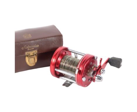 A Vintage Swedish ABU Ambassadeur no. 6000 multiplier reel, in original protective leather case 