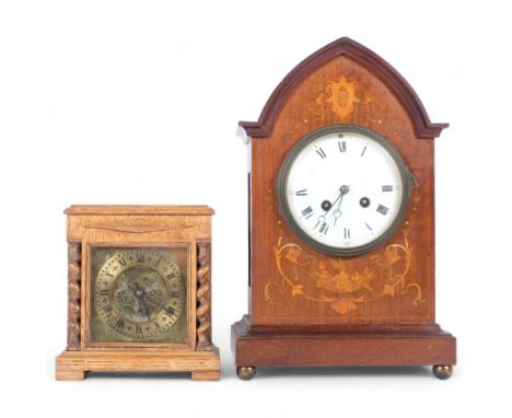 An Edwardian mahogany lancet-top mantel clock, 8-day striking movement on brass bun feet, and floral marquetry decoration, H3