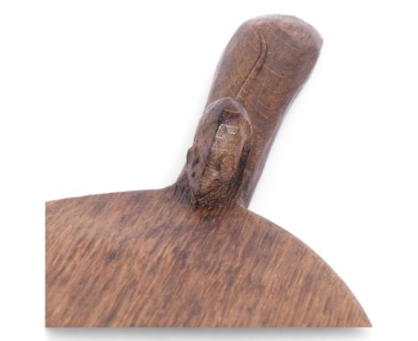 ROBERT MOUSEMAN THOMPSON - an oak oval bread board, with mouse carved handle, L37.5cmGood condition, light wear and knife mar
