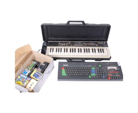 A Casio keyboard, and an Abstract colour professional computer and a quantity of tapes 