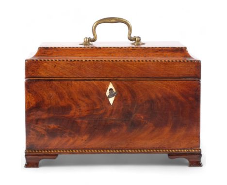A Georgian mahogany tea caddy, with inner fitted lids on bracket feet, W24cm 