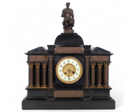 An architectural design black slate-cased mantel clock, with Corinthian columns surmounted by a figure, H53cm 