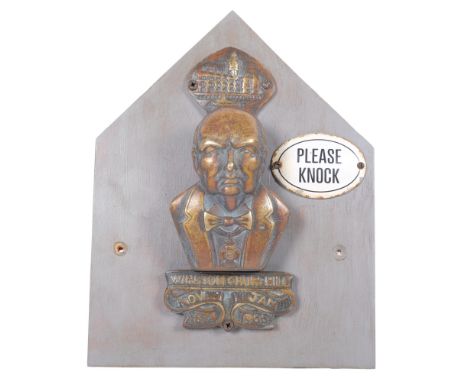 A brass Winston Churchill door knocker, door knocker commemorates birth and death dates of Sir Winston, and an enamel Please 