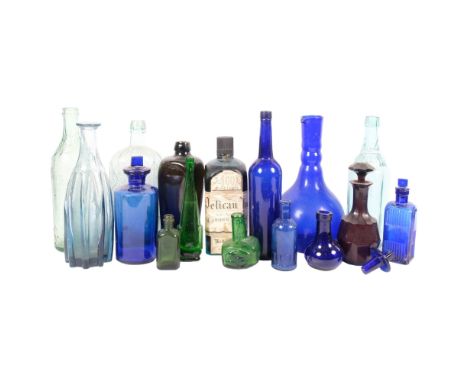 A quantity of Vintage glassware, including various cobalt blue decorative pharmacy bottles, a Vintage blue blown glass vase, 