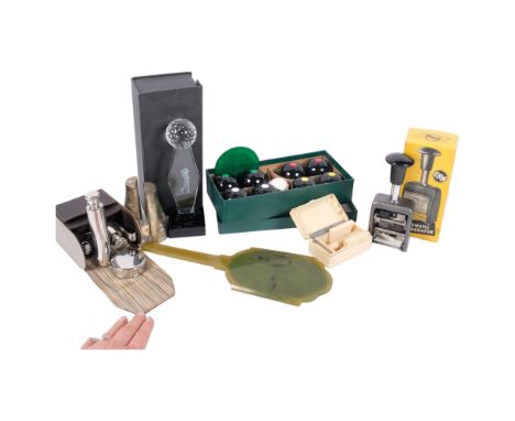 A box of various items, including a numerater?? stamp, razor, indoor bowls game, etc 