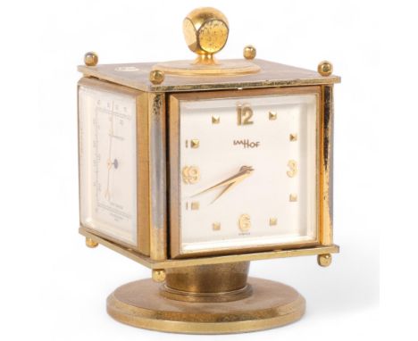 ImHof, a Swiss brass four-sided desk compendium, circa 1950s, displaying time, barometer, hygrometer and thermometer, on revo