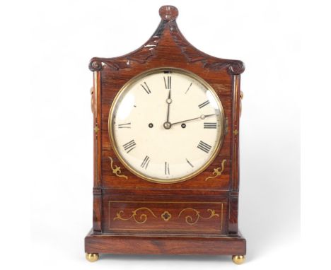 A Regency rosewood pagoda-top bracket clock, with 8-day double fusee bell striking movement, enamel dial, unsigned, raised on