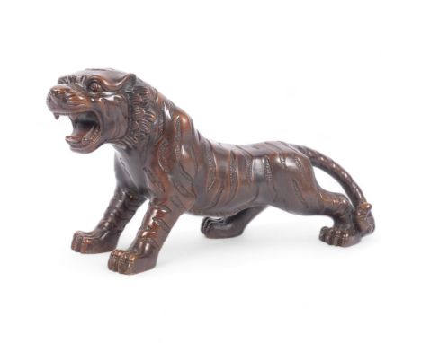 Cast-bronze study of a tiger, L35cm 