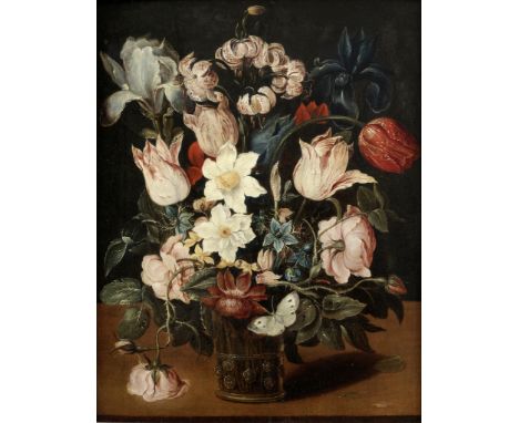 Studio of Osias Beert the Elder (Antwerp circa 1580-1623)Tulips, narcissi, an iris and other flowers in a glass vase on a tab