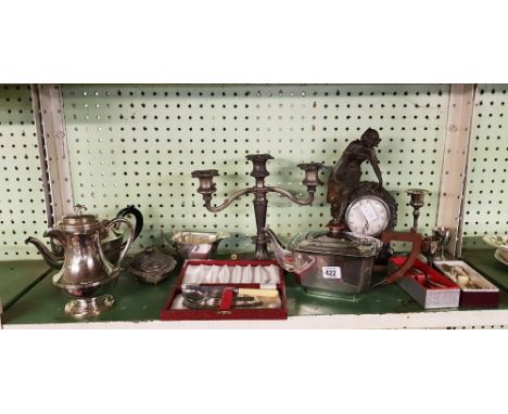 SHELF OF PLATEDWARE &  A CLOCK FIGURE