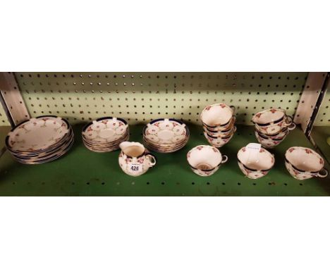 SHELF OF CRESCENT TEA WARE