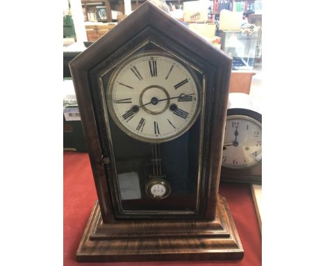 Pair of vintage clocks a Napoleon hat wooden mantle clock and a tall wooden cased clock with pendulum (supplied by M Bayer Wa