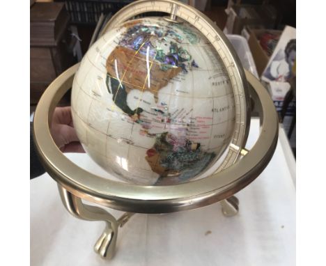 Gemstone Globe with rotating world map globe with semi precious gemstones representing each country  such as mother of pearl,