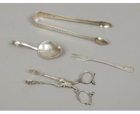 Four pieces of silver including a pair of Georgian sugar tongues, pickle fork, spoon etc, gross weight 80 grams.