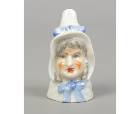A Royal Worcester porcelain candle snuffer Mrs Caudle. Printed puce mark.Condition report intended as a guide only.Good condi