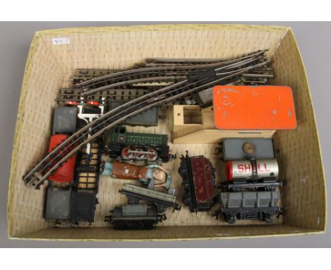 A collection of vintage model railway to include track, Hornby platform, TTR engine and wagons etc.