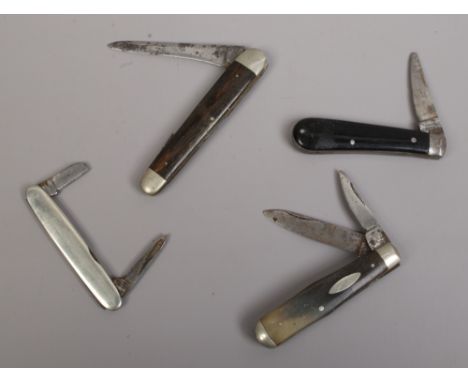 Four folding pocket knives two with horn scales.