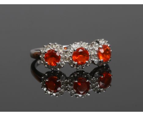 A 9ct white gold, fire opal and diamond dress ring, size L.