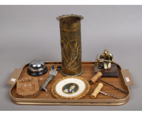 A tray of collectables including a Robert Thompson Mouseman ashtray, late 20th century portrait miniature and trench art.