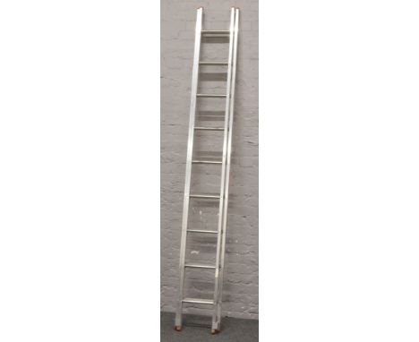 A set of Titan Ladder &amp; Case Co. Ltd aluminium extending ladders, closed 2.8m open 4.8m.