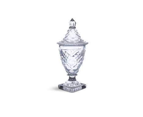 THE JAMESON COLLECTIONA SMALL URN AND COVER, Irish, c.1790, with pyramid cut lid and faceted knob, the body on moulded 'lemon