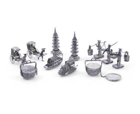 A LARGE COLLECTION OF CHINESE SILVER comprising; three figural groups modelled as tradesmen with accessories, a pair of ricks