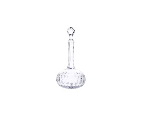 A CUT GLASS DECANTER AND STOPPER, with faceted neck and stopper, the pear shaped body cut with a series of ovals, on a star c