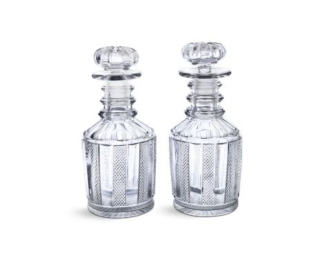 THE JAMESON COLLECTIONA PAIR OF WATERFORD PILLAR AND DIAMOND CUT DECANTERS (with original stoppers), c.1830, triple ring neck