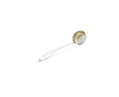 A GERMAN WHITE METAL SOUP LADLE, Stuttgart 19th century, the pan shaped bowl with gilt interior, and tapered handle terminati