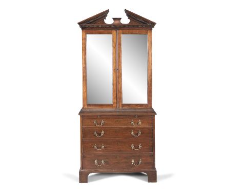 A GEORGE III MAHOGANY BUREAU BOOKCASE, the architectural top with broken triangular pediment and key pattern dentil moulding,