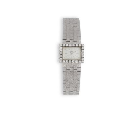 A LADY'S GOLD AND DIAMOND COCKTAIL WATCH BY WEST CIRCA 1965, manual wind movement, the silver dial with baton hour markers, t