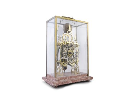 A VICTORIAN BRASS AND STEEL STRIKING SKELETON MANTLE CLOCK, in the Gothic taste, the pierced chapter ring with Roman numerals