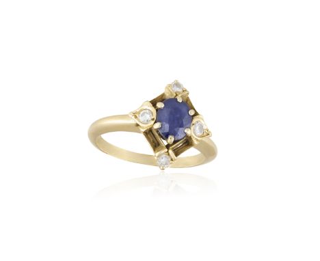 A SAPPHIRE AND DIAMOND RING, the central oval-shaped sapphire accented with four, mounted in gold, ring size K