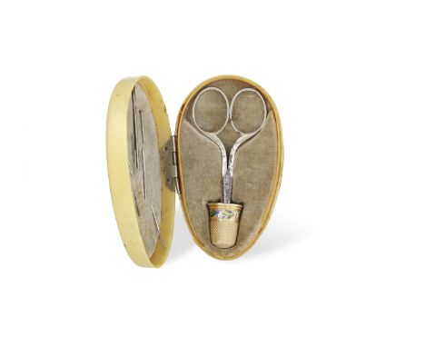 A SEWING KIT, composed of a pair of small scissors, with an 18K gold thimble with enamelled floral decorations, within its fi