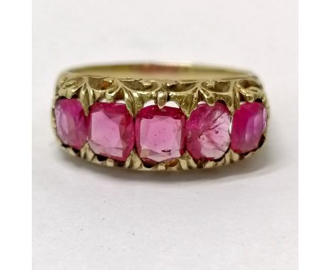 Antique unmarked gold (touch tests as 18ct) 5 stone ruby ring - size N &amp; 4.6g total weight ~ 1 stone is a/f 