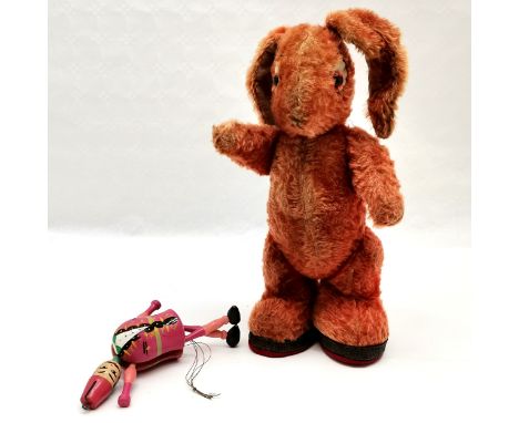 Antique mohair bunny, play worn condition, feet pads replaced, 38 cm high, 21 cm wide, t/w wooden Turkish puppet. 