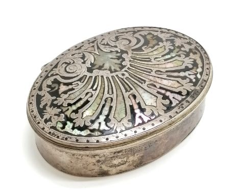 Unmarked antique silver oval box with tortoiseshell lid inlaid with silver and mother of pearl (1 small loss) - 7cm across 