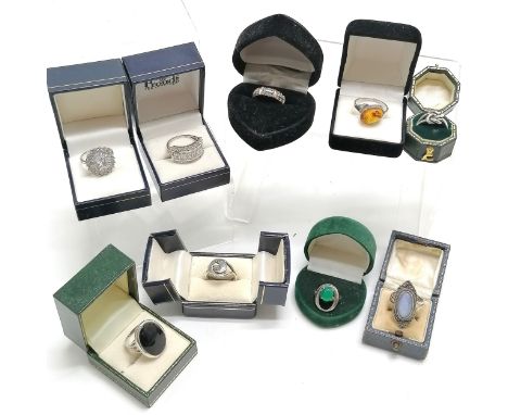 9 x boxed silver rings inc amber, white stone set, oval onyx, celtic knot, opal type (unmarked) etc - total weight 49g 