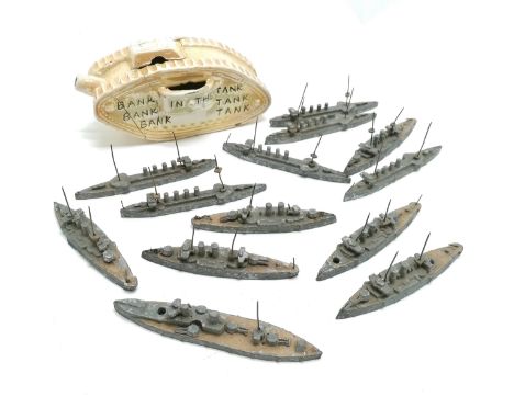 First world war 'bank in the tank' money box as found 16cm t/w second world war lead battle ship models/markers.