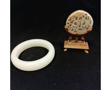 Antique Chinese jade panel with deep carved &amp; pierced decorated dragon detail on later wooden stand (8cm total height) t/