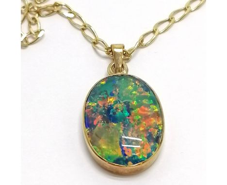 9ct marked gold opal pendant (2.5cm drop) on a 9ct marked gold 44cm chain ~ 5.1g total weight 