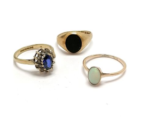 3 x 9ct marked gold rings - opal, blue / white stone cluster, black onyx - total weight 6.4g - SOLD ON BEHALF OF THE NEW BREA