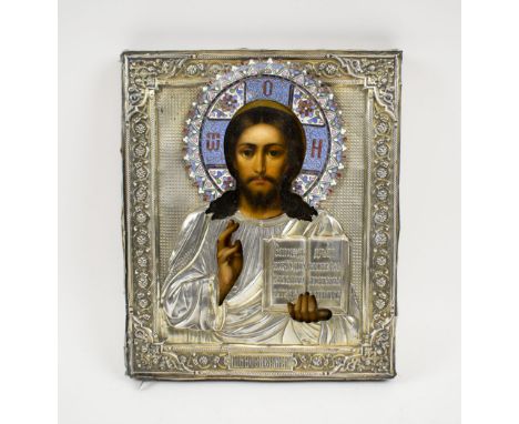 RUSSIAN ICON, depicting Christ Pantocrater with hallmarked silver oklad and coloured enamel halo, 27cm H x 22cm W.