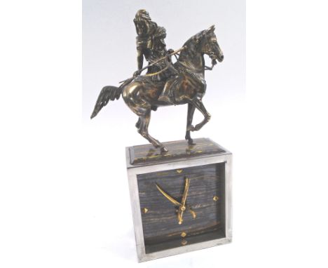 MANTEL CLOCK, with plated Arab horseman surmount, the dial with hands in the form of Arab swords, 30cm H overall. (with fault