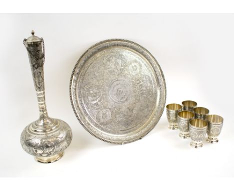 PERSIAN SILVER WINE/WATER SET, comprising a circular tray, 40cm diam.; plus flask, 43cm H, and six beakers, all engraved trad