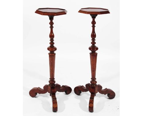 A NEAR PAIR OF 19TH CENTURY DUTCH OAK AND FLORAL MARQUETRY OCTAGONAL CANDLE STANDS on ring turned and hexagonal columns termi